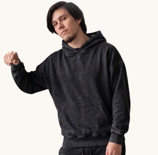 Polerón  oversize Boxy Fit  Acid Wash  negro  de algodón cuello cruzado